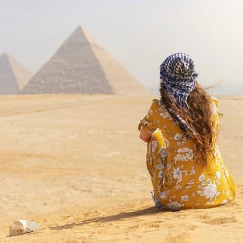 woman and pyramids